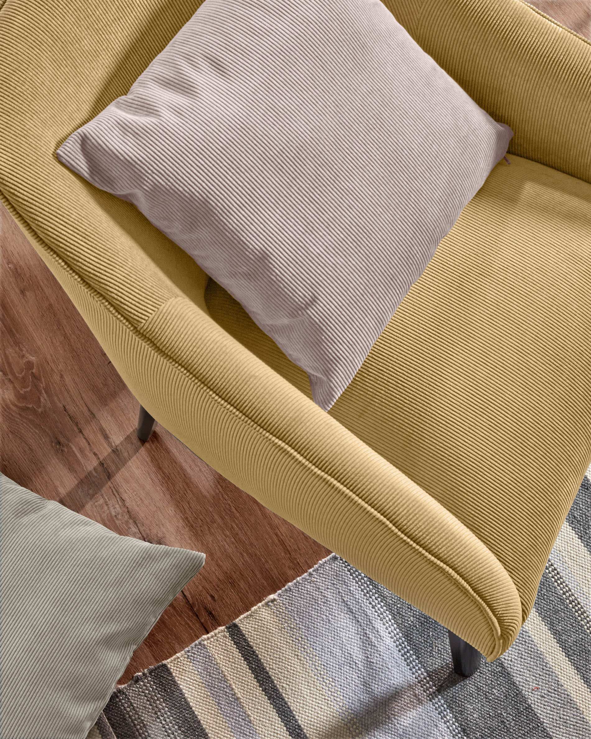 mustard and grey armchair