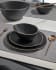 Manami flat ceramic plate in black