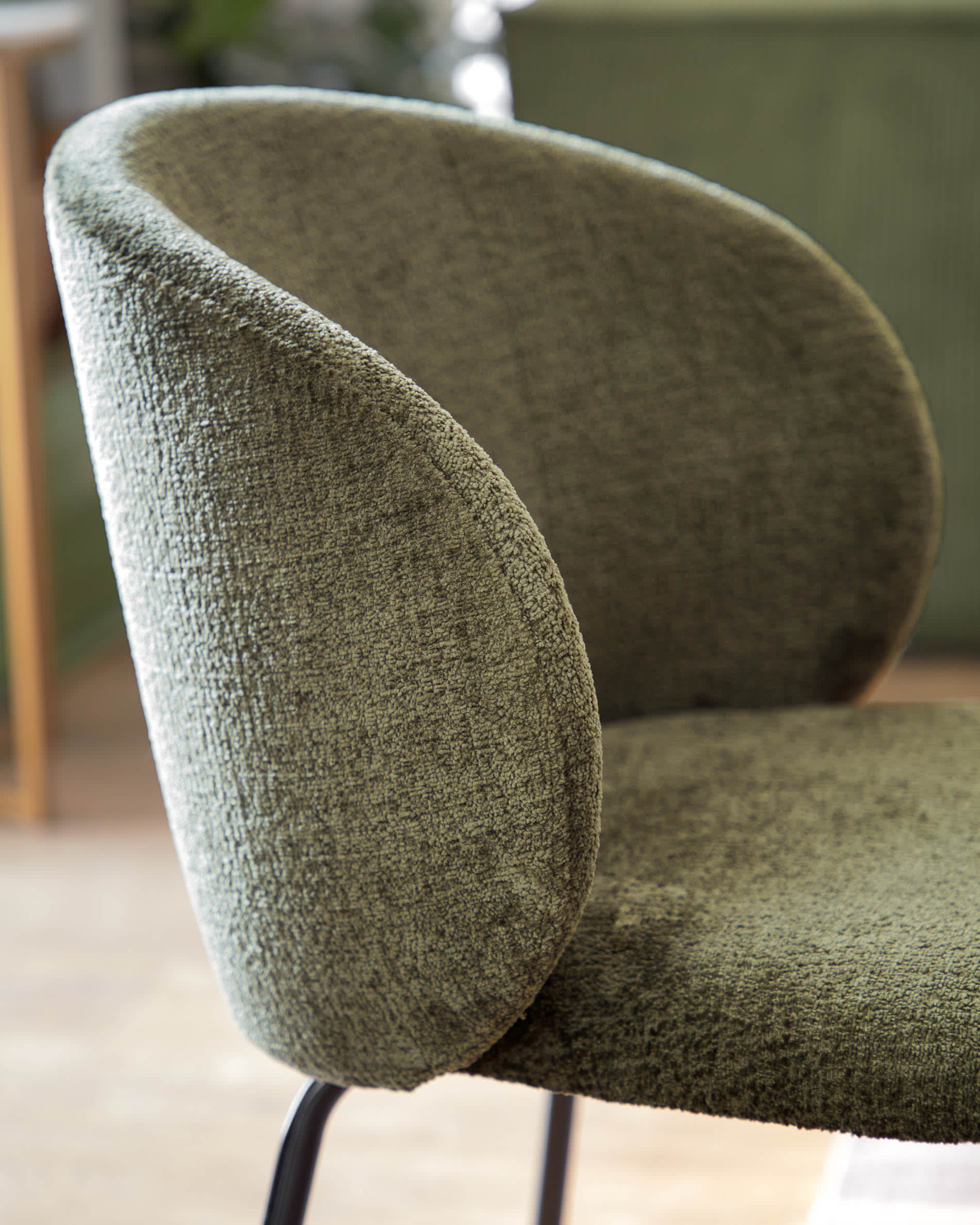 Minna chenille chair in green with steel legs in a black finish