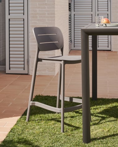 Morella stapelbarer Outdoor-Hocker aus grauem Kunststoff Höhe 65 cm