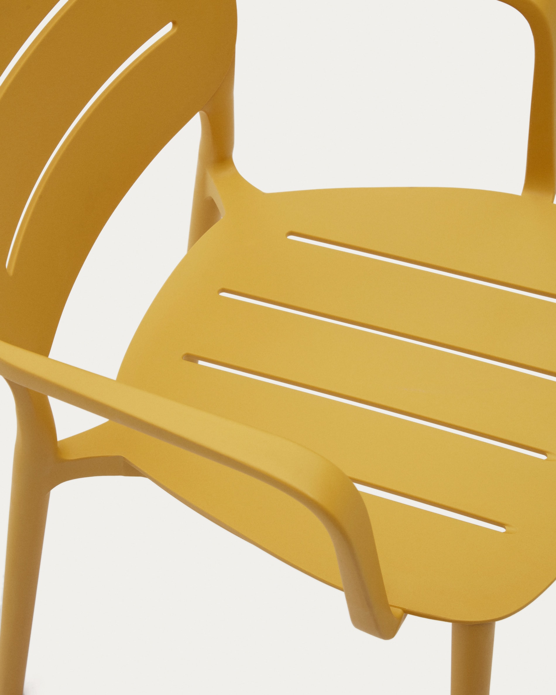 Yellow plastic store outdoor chairs